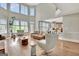 Open living room with hardwood floors, large windows, and modern decor at 285 Broadmoor Dr, Fayetteville, GA 30215