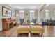 Bright living room featuring hardwood floors, neutral walls, and stylish decor at 285 Broadmoor Dr, Fayetteville, GA 30215