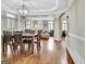 Open-concept living and dining area featuring hardwood floors, natural light, and neutral walls at 285 Broadmoor Dr, Fayetteville, GA 30215