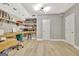 Bright office space with built-in shelves, offering ample storage and display options at 285 Broadmoor Dr, Fayetteville, GA 30215