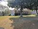 Lovely single story home with mature trees, partial basement access and a covered front porch at 4365 Newton Cir, Douglasville, GA 30134