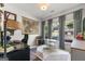 Bright bedroom or office space featuring neutral decor, large windows, and ample natural light at 2940 Parkridge Ne Dr, Brookhaven, GA 30319