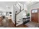 Inviting entryway with hardwood floors, staircase and a glimpse of the living room at 2940 Parkridge Ne Dr, Brookhaven, GA 30319
