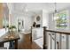 Upstairs landing with hardwood floors and a desk with a decorative chandelier at 2940 Parkridge Ne Dr, Brookhaven, GA 30319
