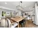 Bright open-concept living area with a dining table and full kitchen views, great for entertaining and everyday living at 2940 Parkridge Ne Dr, Brookhaven, GA 30319
