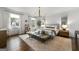 Spacious and bright main bedroom featuring a seating area, large windows, and elegant decor at 2940 Parkridge Ne Dr, Brookhaven, GA 30319