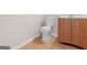 Bathroom featuring a light wood vanity and toilet at 1508 Bonanza Church Rd, Jonesboro, GA 30238