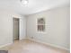 Bedroom with carpeted floors, closet and a bright window at 1508 Bonanza Church Rd, Jonesboro, GA 30238