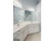 Bathroom with double sinks, vanity, and a large mirror, providing ample space at 12711 Simmons Rd, Hampton, GA 30228