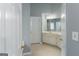 Bathroom offers ample counter space and cabinets for storage, plus a separate room for the toilet at 12711 Simmons Rd, Hampton, GA 30228