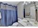 Bright bathroom with walk-in shower, white sink cabinet and towel rack near toilet at 3230 Riverhill Ct, Cumming, GA 30041