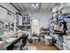 Bright craft room with sewing station, organization shelves and lots of storage at 3230 Riverhill Ct, Cumming, GA 30041