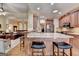 Gourmet kitchen with granite countertops, stainless steel appliances, and a breakfast bar at 3230 Riverhill Ct, Cumming, GA 30041