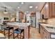 Beautiful kitchen featuring stainless steel appliances, a granite countertop, and breakfast bar at 3230 Riverhill Ct, Cumming, GA 30041