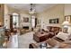 Spacious living room with a fireplace, hardwood floors and plenty of natural light at 3230 Riverhill Ct, Cumming, GA 30041