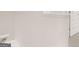 Bright bathroom featuring white walls, trim, and carpet at 8593 Secretariat Dr # 20, Lithonia, GA 30058