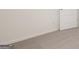 Bedroom featuring neutral-colored carpet and white baseboards along the wall at 8593 Secretariat Dr # 20, Lithonia, GA 30058