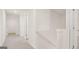 Neutral hallway with white doors and trim at 8593 Secretariat Dr # 20, Lithonia, GA 30058