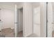 Hallway with doorways to storage, bathrooms and bedrooms at 8593 Secretariat Dr # 20, Lithonia, GA 30058