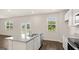 Modern kitchen with stainless steel appliances, granite countertops, and an island with a sink and a dishwasher at 8593 Secretariat Dr # 20, Lithonia, GA 30058