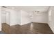 Spacious living room with hardwood floors, multiple closets, and stairway access to the upper level at 8593 Secretariat Dr # 20, Lithonia, GA 30058
