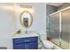 This bathroom includes a vanity with sink, a toilet, and a glass shower at 168 Lakeview Dr, Grantville, GA 30220