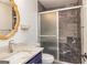 This bathroom includes a shower, toilet, and vanity with sink at 168 Lakeview Dr, Grantville, GA 30220