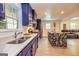 Modern kitchen featuring a quartz island, stainless steel appliances, and lots of natural light at 168 Lakeview Dr, Grantville, GA 30220