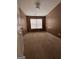 View of an empty bedroom with carpet and neutral color, awaits your personal touch at 1132 Saint Phillips Ct # 90, Locust Grove, GA 30248