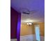 Dining room featuring unique ceiling texture, hanging light, and back door at 1132 Saint Phillips Ct # 90, Locust Grove, GA 30248