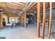 Unfinished basement with exposed ductwork, wooden frame, and visible support beams at 170 Austin Oaks Dr, Ellenwood, GA 30294