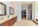 Bathroom showcases dual vanities and access to soaking tub at 170 Austin Oaks Dr, Ellenwood, GA 30294