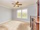 Bedroom with a large window overlooking a lake and a ceiling fan at 170 Austin Oaks Dr, Ellenwood, GA 30294
