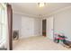 Cozy bedroom featuring built-in closets and natural light at 170 Austin Oaks Dr, Ellenwood, GA 30294
