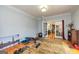 Versatile bonus room with hardwood floors and french doors, perfect for a gym or hobby area, adding functionality at 170 Austin Oaks Dr, Ellenwood, GA 30294