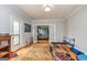 Spacious bonus room with hardwood floors, french doors, and neutral paint, great for hobbies, games, or relaxing at 170 Austin Oaks Dr, Ellenwood, GA 30294