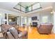 Bright living room with hardwood floors, a fireplace, and a soaring ceiling at 170 Austin Oaks Dr, Ellenwood, GA 30294