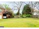 Large backyard with deck and hot tub is ideal for recreation at 101 Westminster Way, Mcdonough, GA 30253