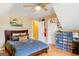 Bedroom with natural light featuring a bed, hardwood floors and built-in storage at 101 Westminster Way, Mcdonough, GA 30253