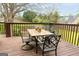 Spacious wooden deck with outdoor dining furniture at 101 Westminster Way, Mcdonough, GA 30253