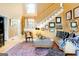Bright living room featuring a grand staircase, hardwood floors, elegant decor, and cozy seating arrangements at 101 Westminster Way, Mcdonough, GA 30253
