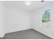Bedroom featuring a large window providing ample natural light at 5728 Rock Shoals Way, Atlanta, GA 30349