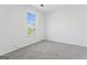 Bedroom featuring a large window providing ample natural light at 5728 Rock Shoals Way, Atlanta, GA 30349