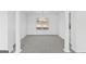 Dining room featuring a large window and neutral carpet at 5728 Rock Shoals Way, Atlanta, GA 30349