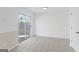 Bright room with tile flooring and sliding glass door to backyard at 5728 Rock Shoals Way, Atlanta, GA 30349