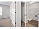 Bright bedroom featuring a walk-in closet and a door to the laundry room for added convenience at 789 Galveston Way, Mcdonough, GA 30253
