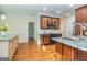 Traditional kitchen with stainless steel appliances, granite countertops, and wood cabinets at 1015 Middlebrook Dr, Mcdonough, GA 30252