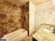 Updated bathroom featuring decorative tiling, modern fixtures, and granite vanity at 645 Crossbridge Aly, Johns Creek, GA 30022