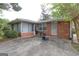 View of the backyard, featuring a concrete patio and access to the house at 3257 Greenvale Way, Decatur, GA 30034