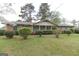 Charming brick home with green shutters and well-maintained landscaping at 3257 Greenvale Way, Decatur, GA 30034